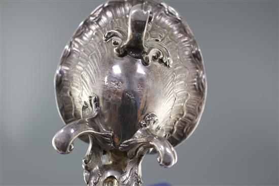 An 18th century French rococco white metal double salt, with hinged covers, on scrolling feet, marks quite rubbed, 18.3cm, 12.5oz,